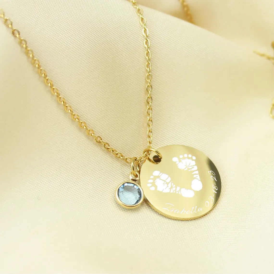 "Personalized silver handprint disc necklace with custom name engraving and birthstone charm."