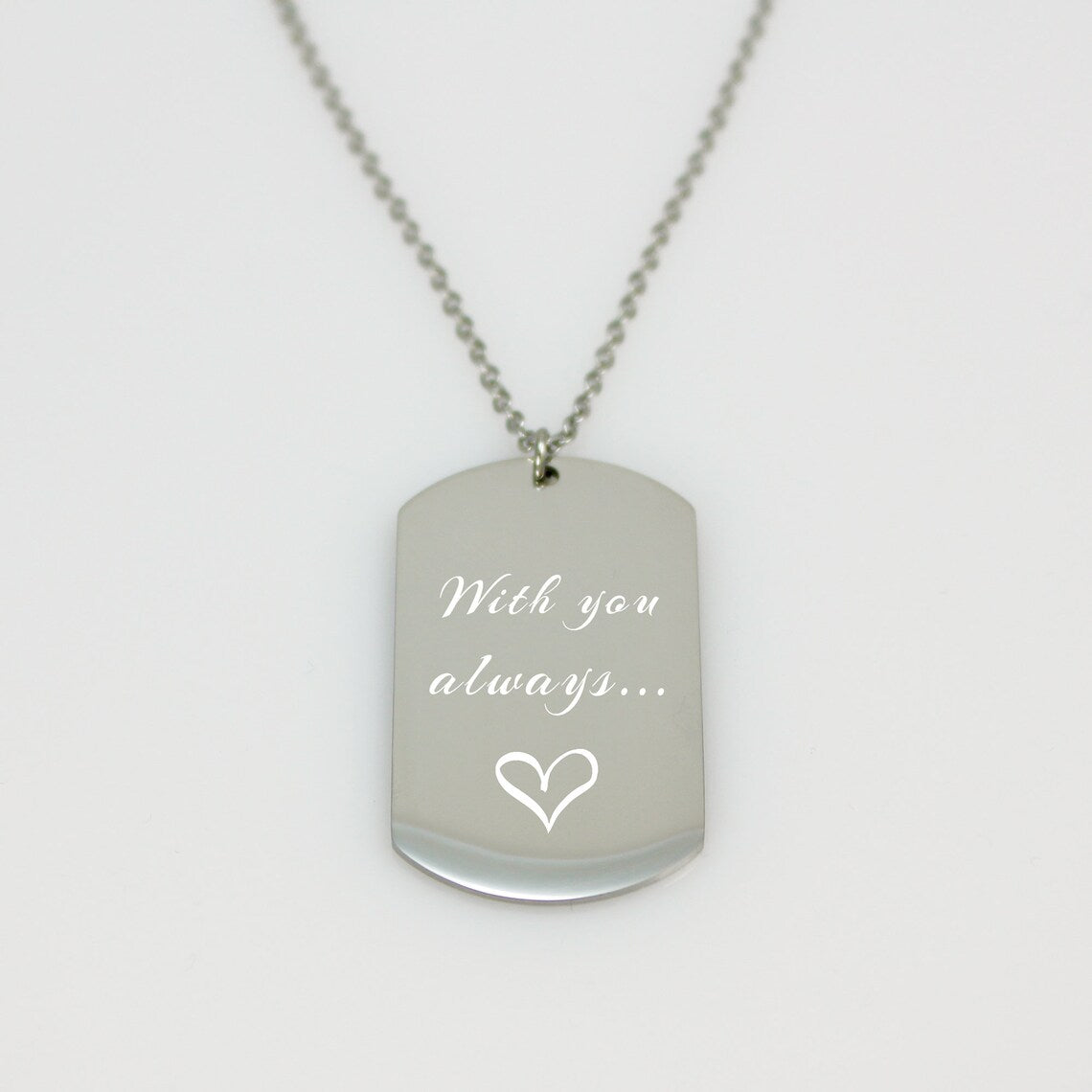 "Custom handwriting dog tag necklace in a brushed silver finish. A high-definition actual thumbprint is laser-engraved onto a vertical rectangular pendant with curved edges."