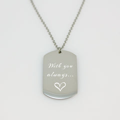 "Custom handwriting dog tag necklace in a brushed silver finish. A high-definition actual thumbprint is laser-engraved onto a vertical rectangular pendant with curved edges."