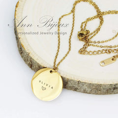 Custom engraved name disc necklaces in gold.