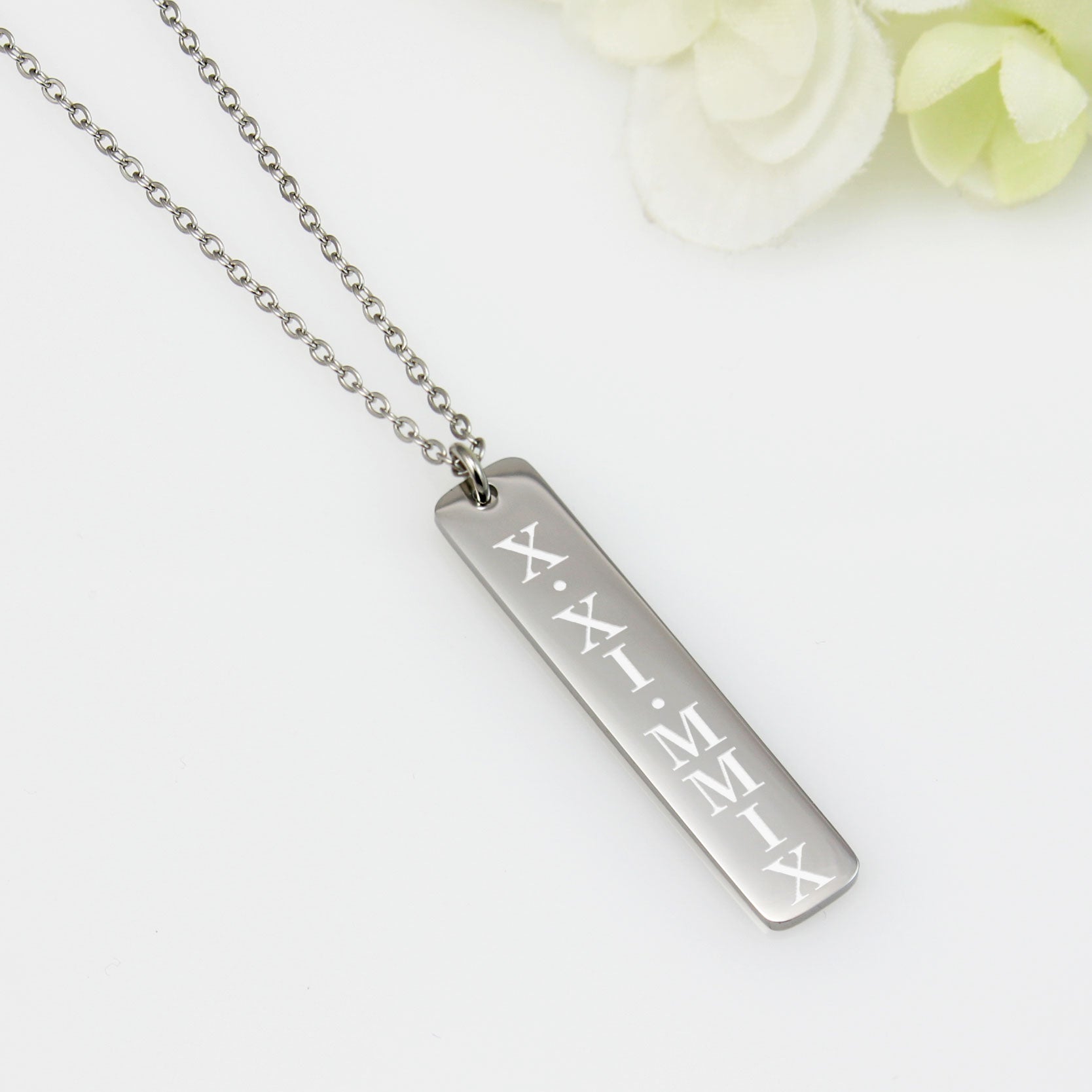 Sophisticated and sleek, this pendant turns a special date into a timeless statement piece, blending modern minimalist design with deep personal meaning.