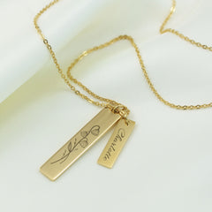 engraved gold necklace with birth flower and name