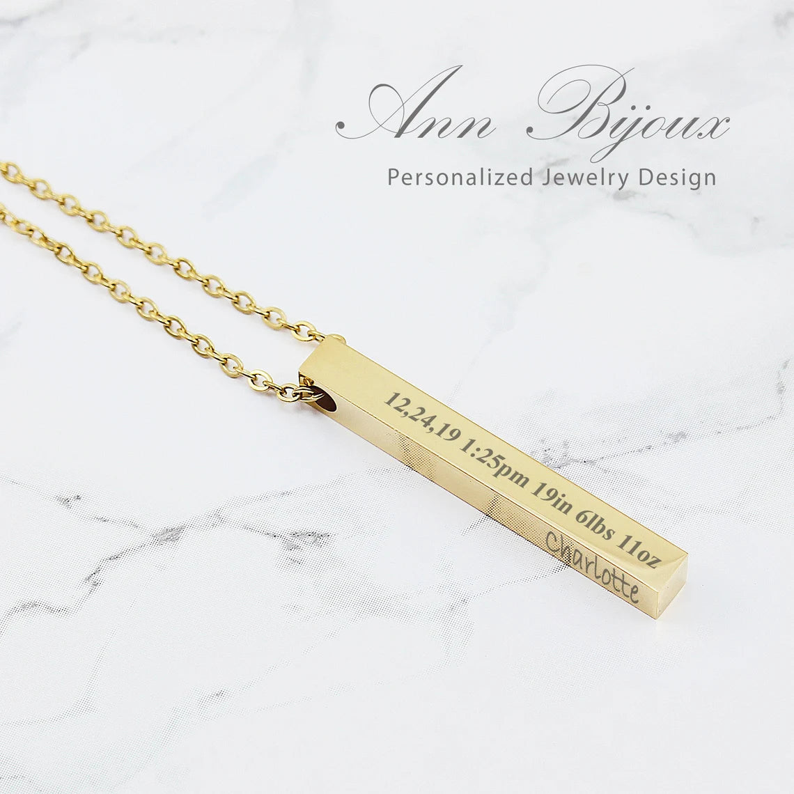 Custom engraved vertical bar necklace in gold and rose gold, personalized coordinate jewelry and Roman numeral anniversary gift.
