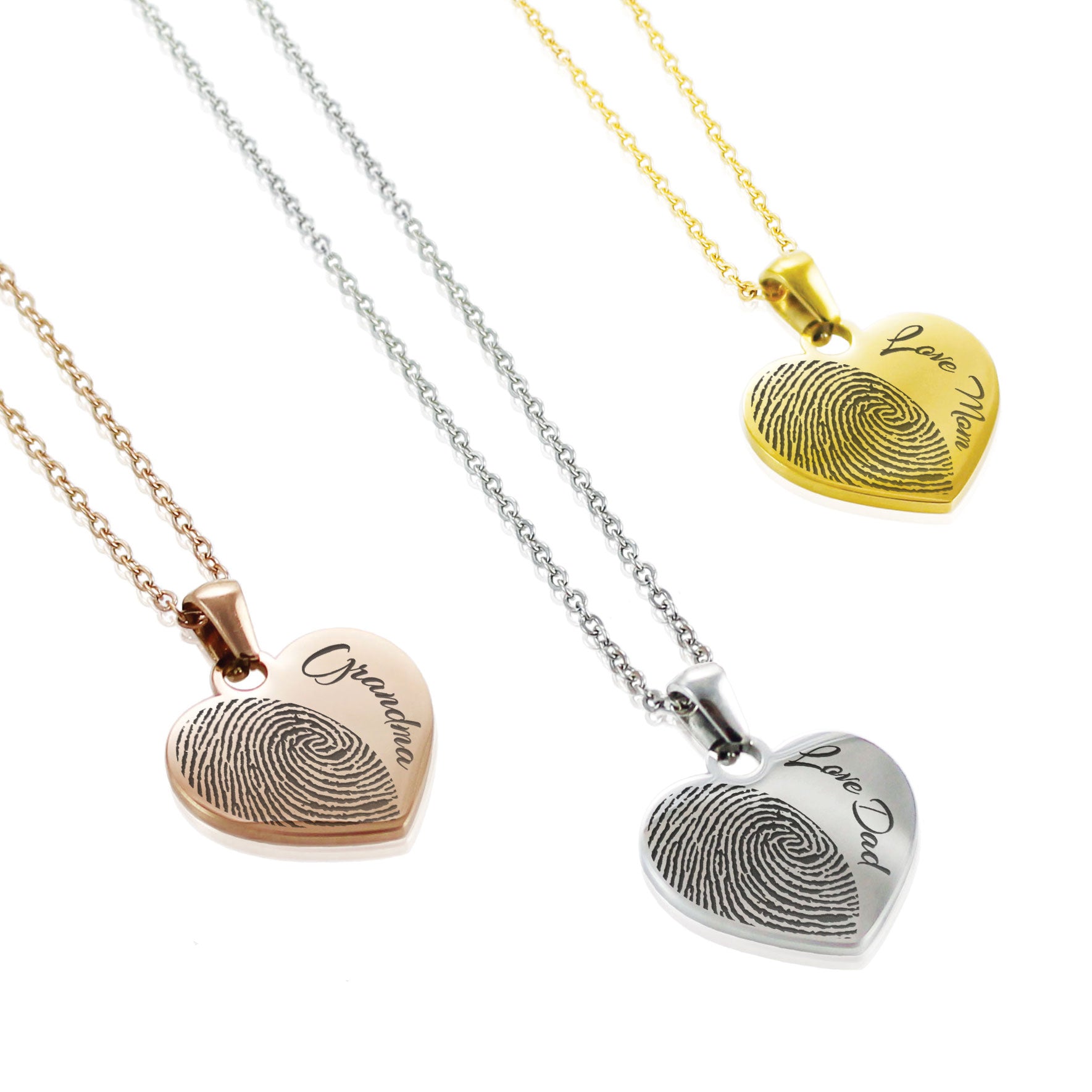 Heart-shaped fingerprint pendants on necklaces with 'Love Dad' engraving.