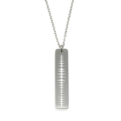 Custom sound wave engraved silver bar necklace. Personalized vertical pendant for voice recording jewelry or heartbeat keepsakes.