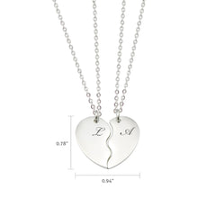 Personalized silver break-apart heart necklaces with custom initial engravings for couples or best friends.