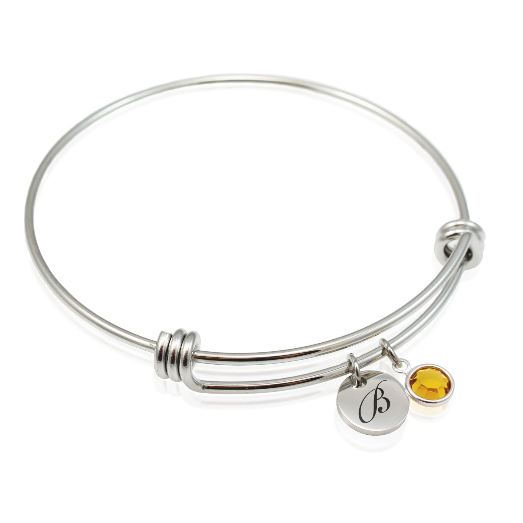 An adjustable stainless steel bracelet with a customized engraved initial and a Swarovski birthstone bead.