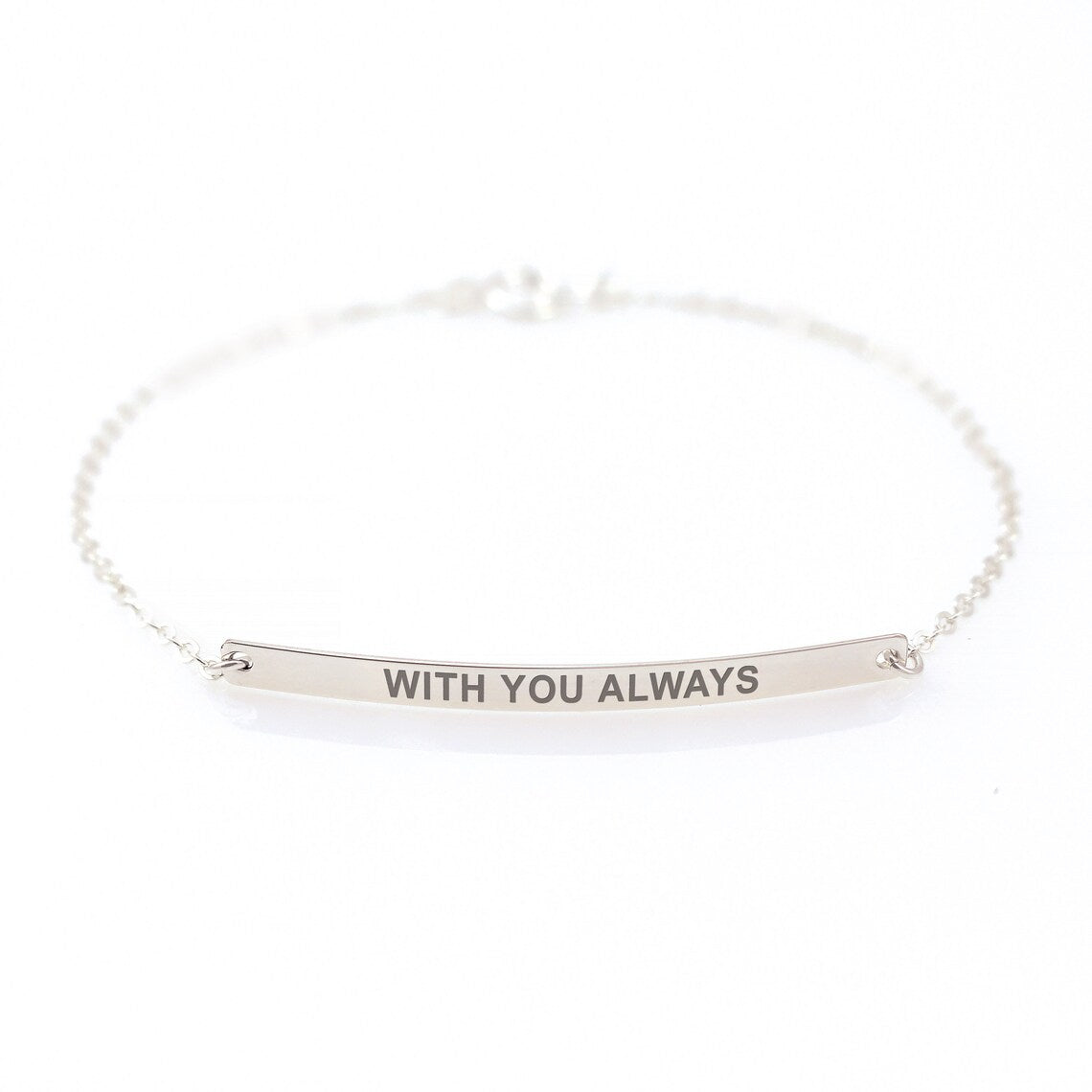 Custom coordinate engraved silver bar bracelet. Personalized latitude and longitude jewelry on a delicate silver link chain for a meaningful anniversary or graduation gift.