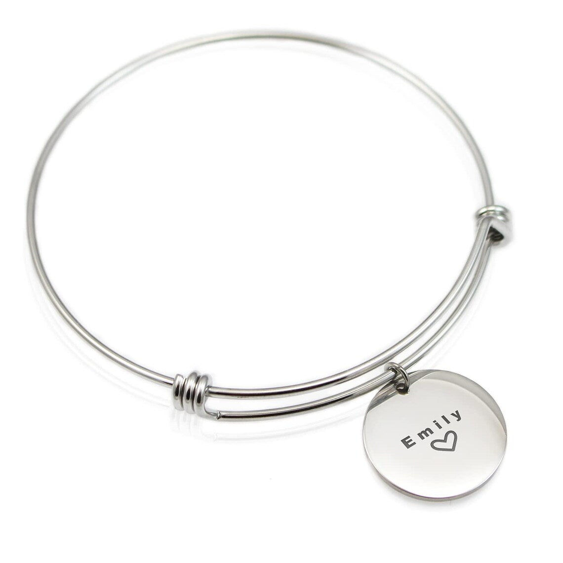 Silver bracelet with a heart-shaped charm engraved with 'Emily' on a white background