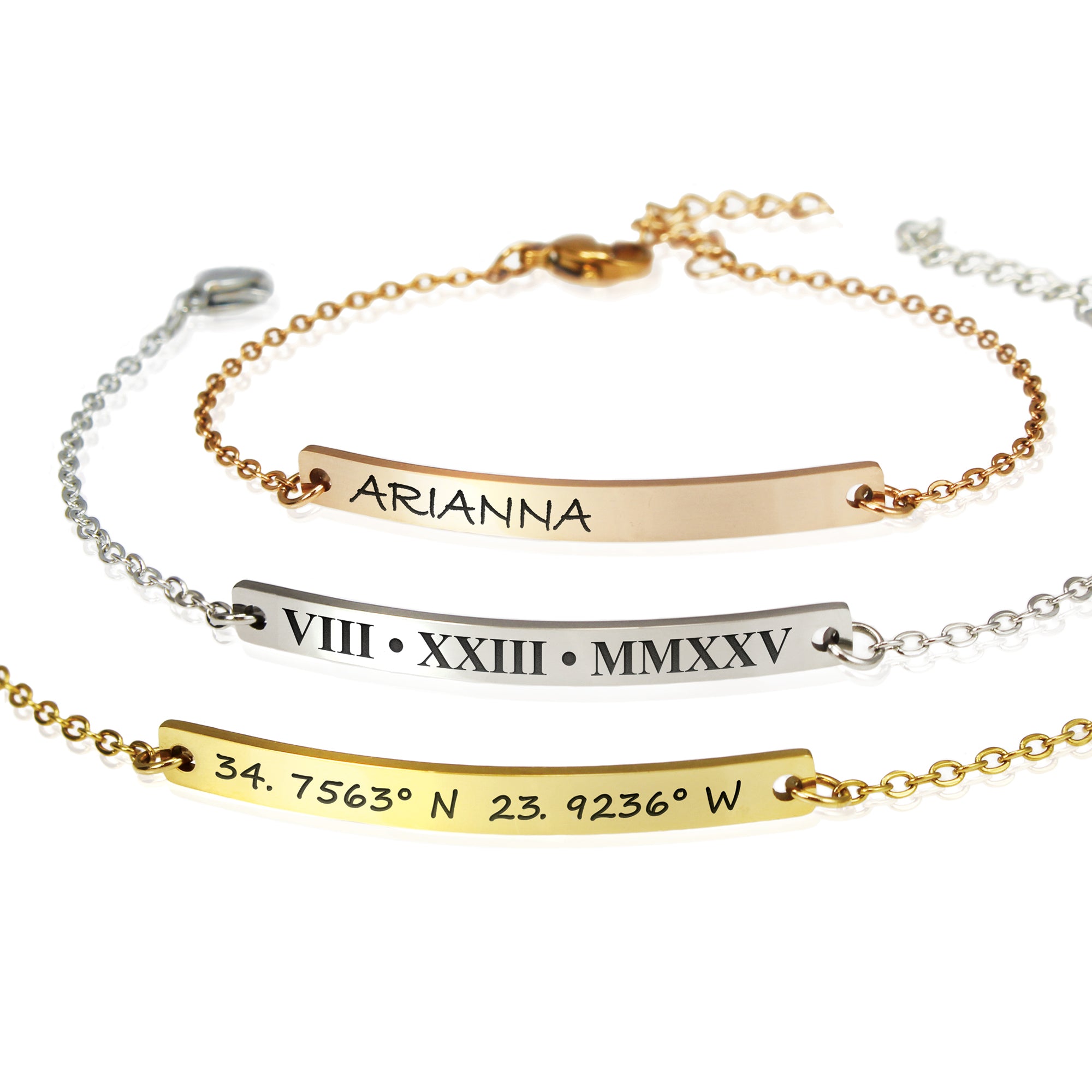 Gold and silver bracelets with engraved text on a white background