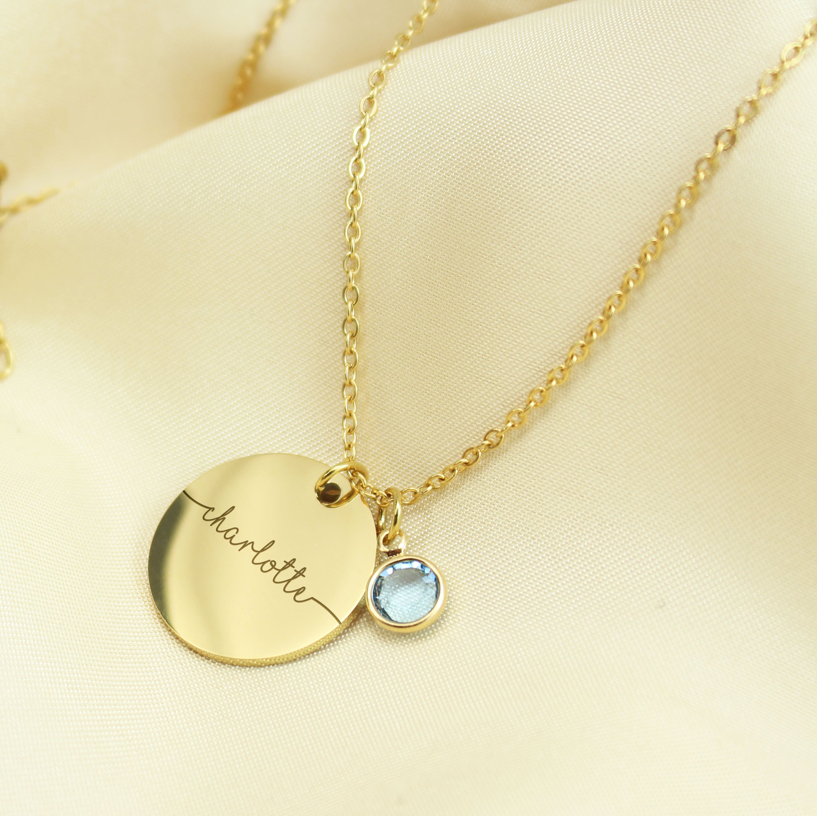 "Personalized round name necklaces with birthstones in silver, gold, and rose gold."