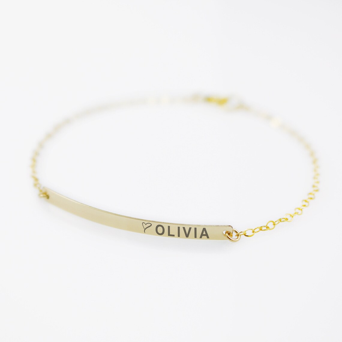 Personalized gold filled bar bracelet engraved with custom GPS coordinates. A minimalist dainty chain bracelet for women, perfect for commemorating a special location or travel memory.