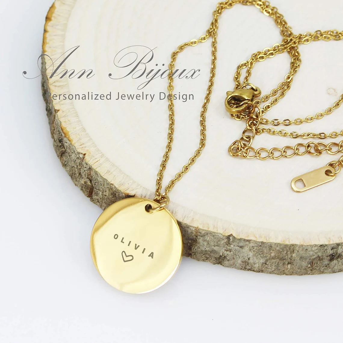Custom engraved name disc necklaces in gold.
