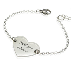 Silver bracelet with a heart-shaped tag engraved 'With you always' on a white background
